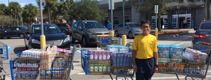 Cruz Helmstetter '25 raised $377 to purchase a total of 374 food items for a schoolwide food drive benefiting the St. Petersburg Free Clinic.