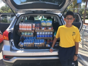 Cruz Helmstetter '25 raised $377 to purchase a total of 374 food items for a schoolwide food drive benefiting the St. Petersburg Free Clinic.